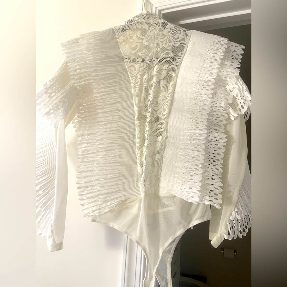White frilly bodysuit